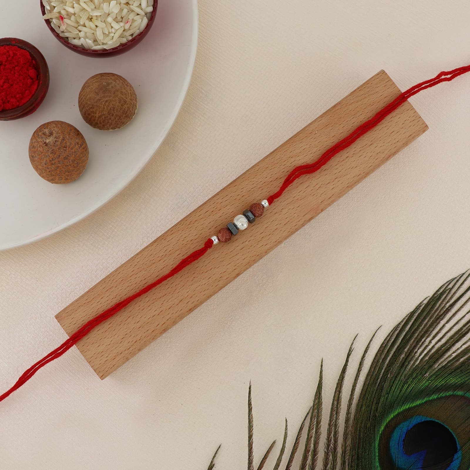 Silver Goldstone & Hematite Rakhi | Protective Healing Stone Rakhi with Silver Center Bead | Adjustable Red Thread