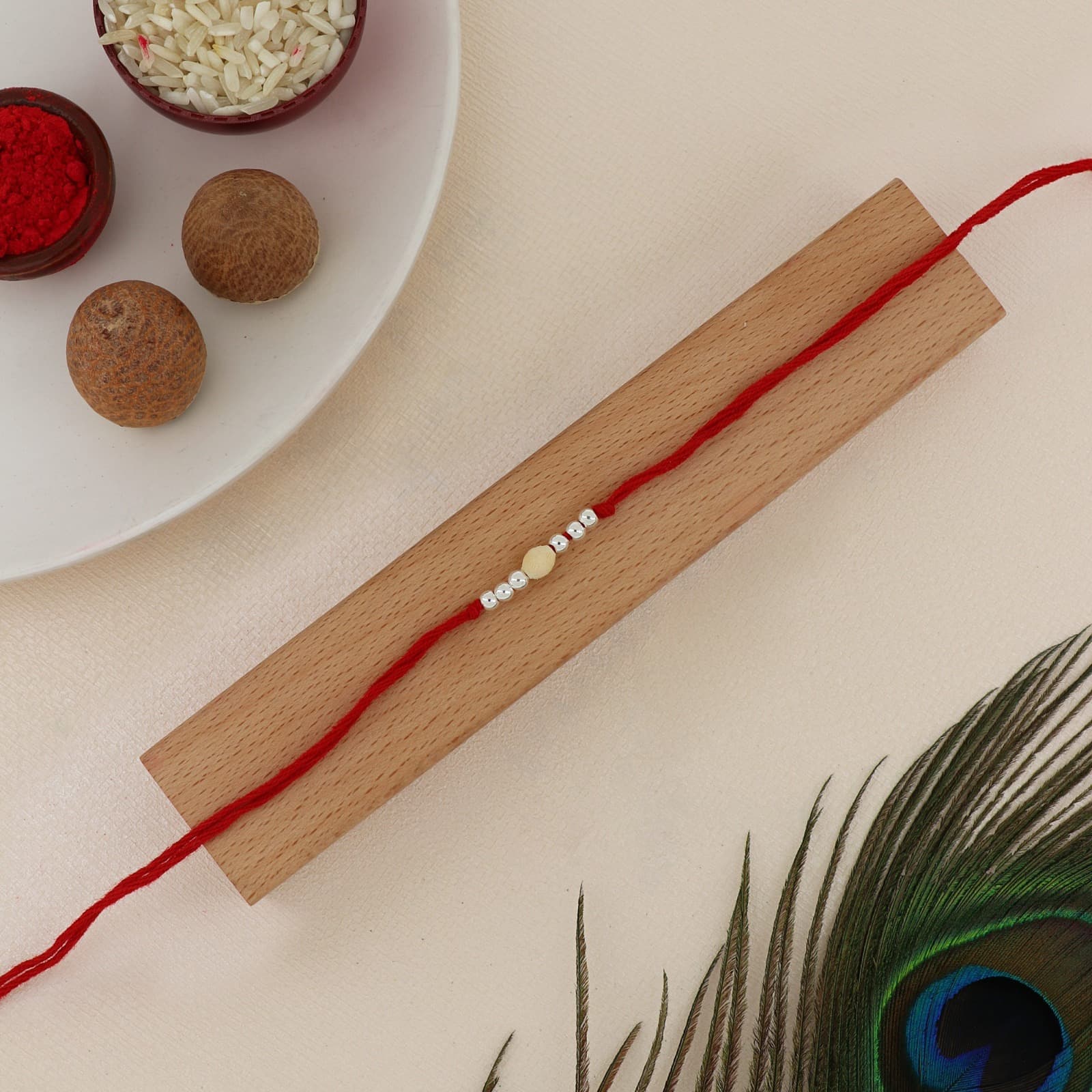 Silver Wooden Bead Rakhi | Minimalist Wooden Center Bead with Silver Accents | Adjustable Red Thread