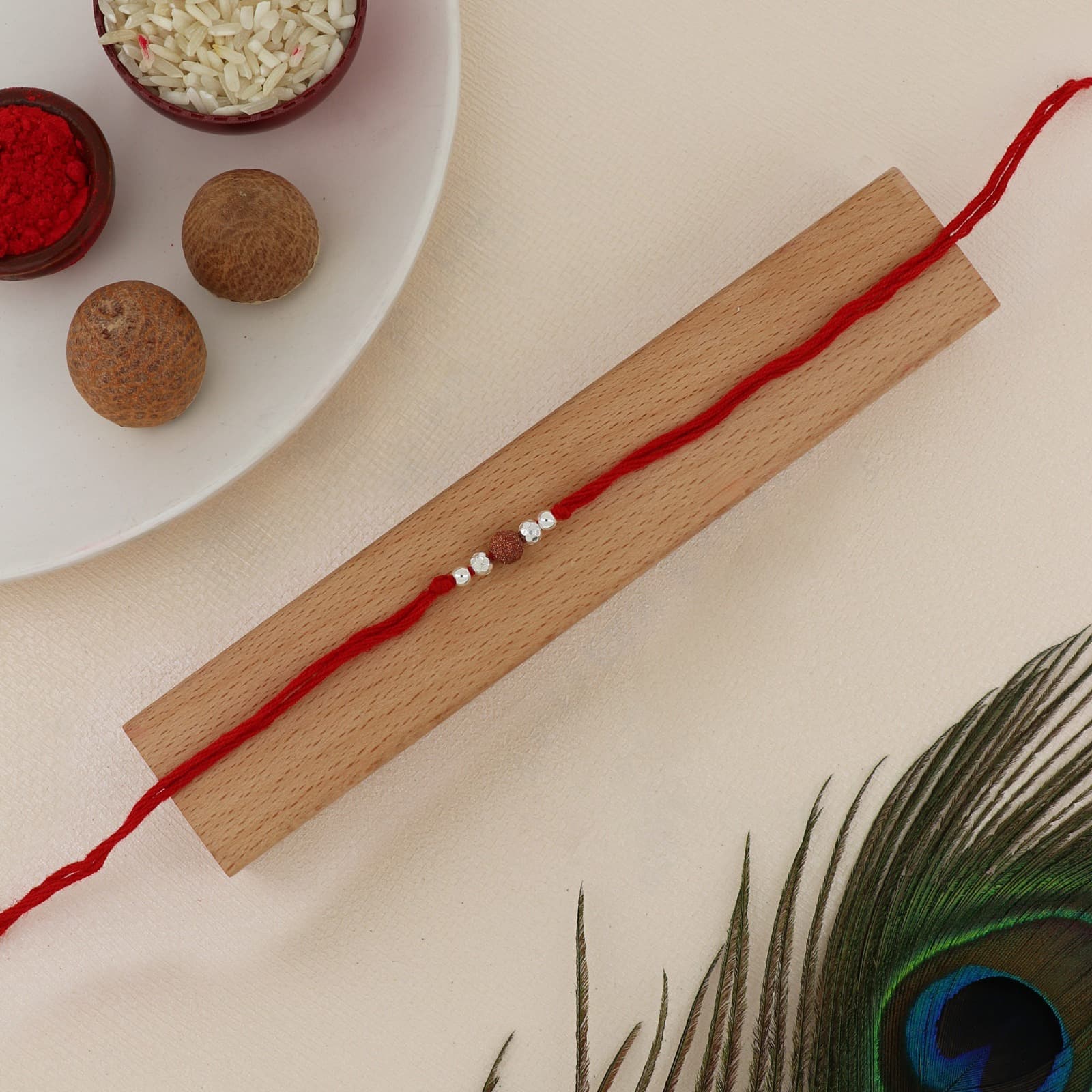 Silver Rudraksha Bead Rakhi | Sacred Rudraksha with Silver Accents | Adjustable Red Thread