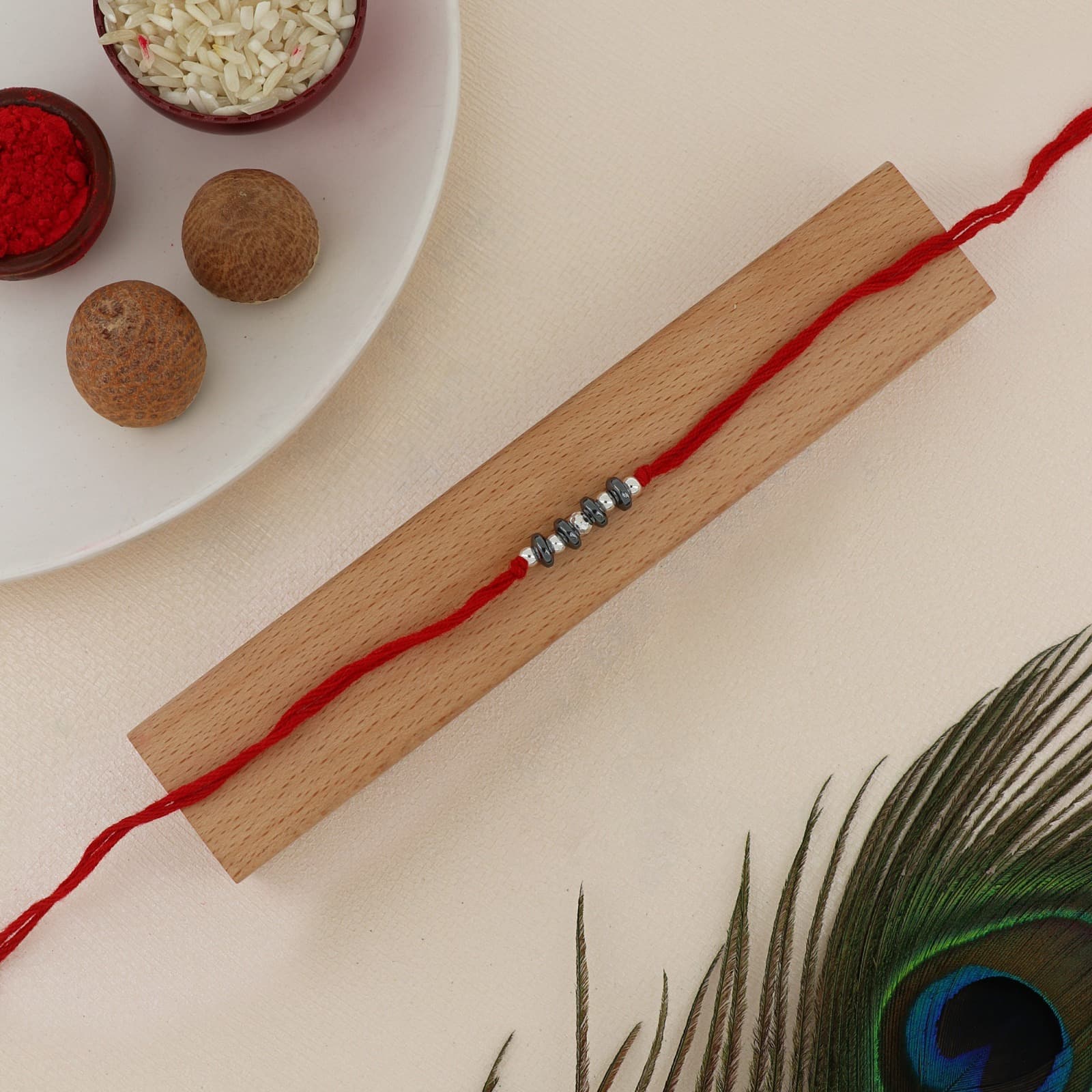 Silver Hematite Disc Bead Rakhi | Modern Hematite & Silver Beads | Adjustable Red Thread